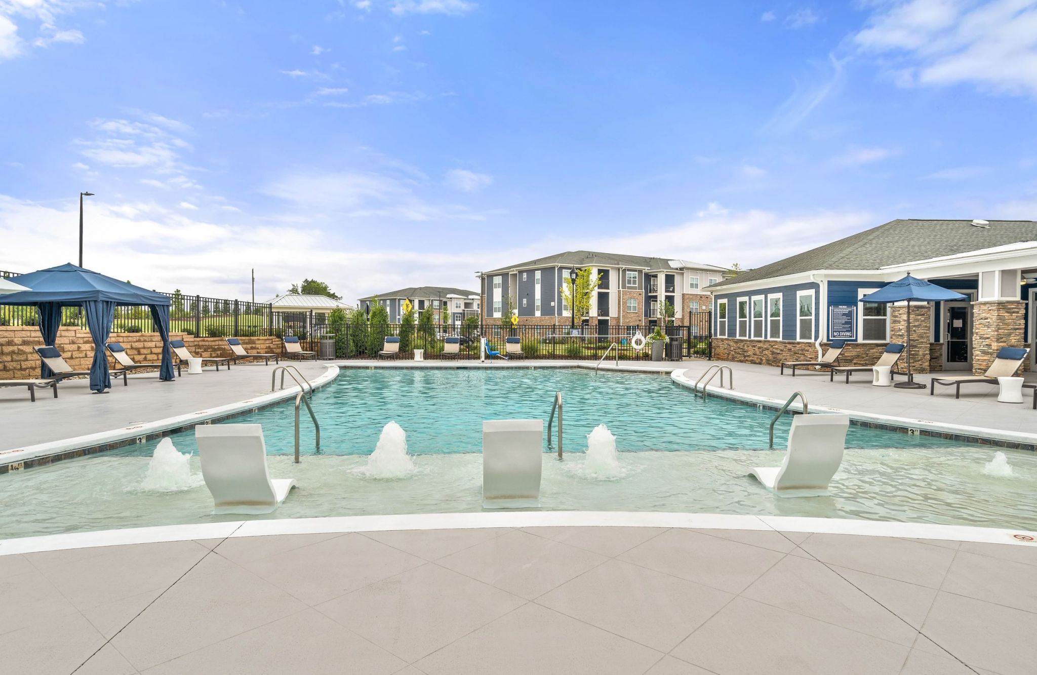 Hawthorne at The Glen luxurious outdoor pool with lounge seating